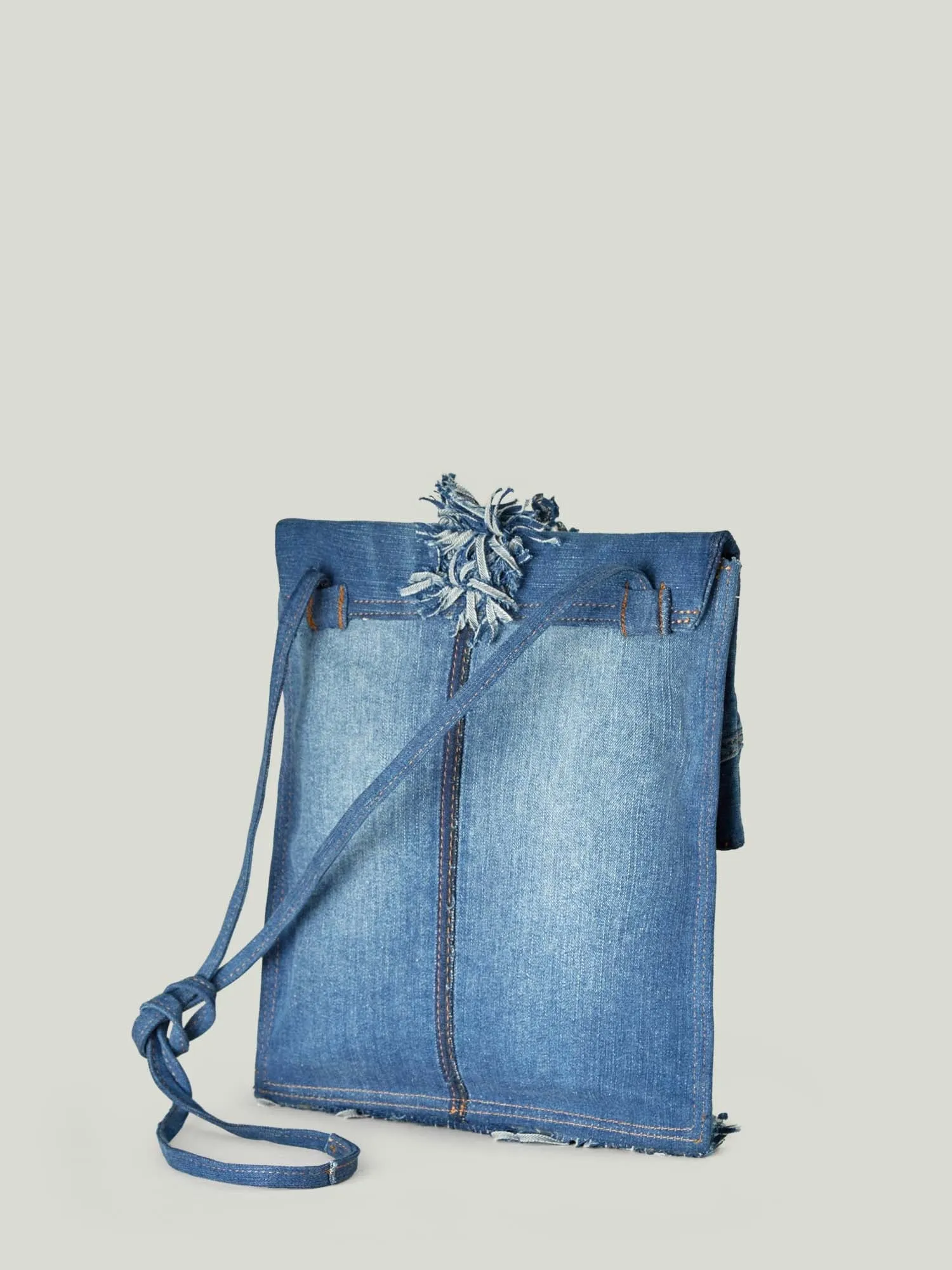 DENIM MESSENGER BAG WITH CENTRAL FRINGES