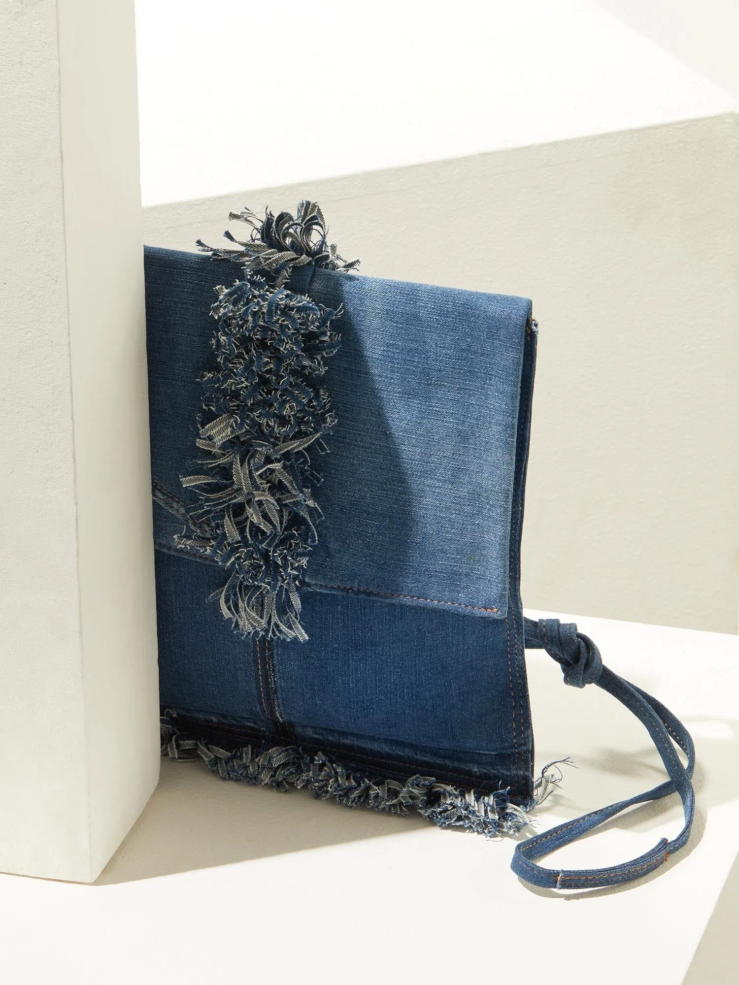 DENIM MESSENGER BAG WITH CENTRAL FRINGES