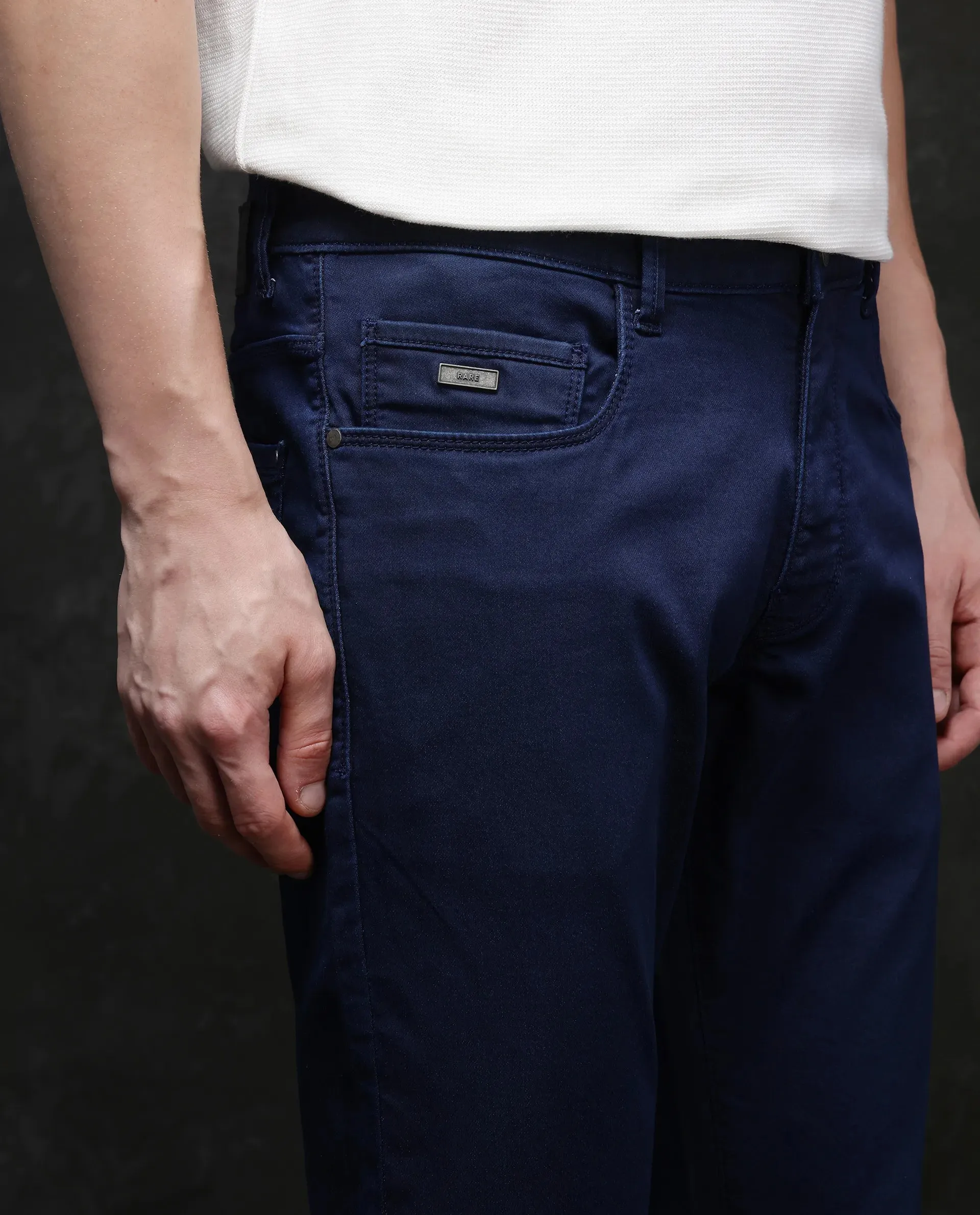 Rare Rabbit Men Corvo Blue Cotton Polyester Fabric Slim Fit Plain Denim Pant