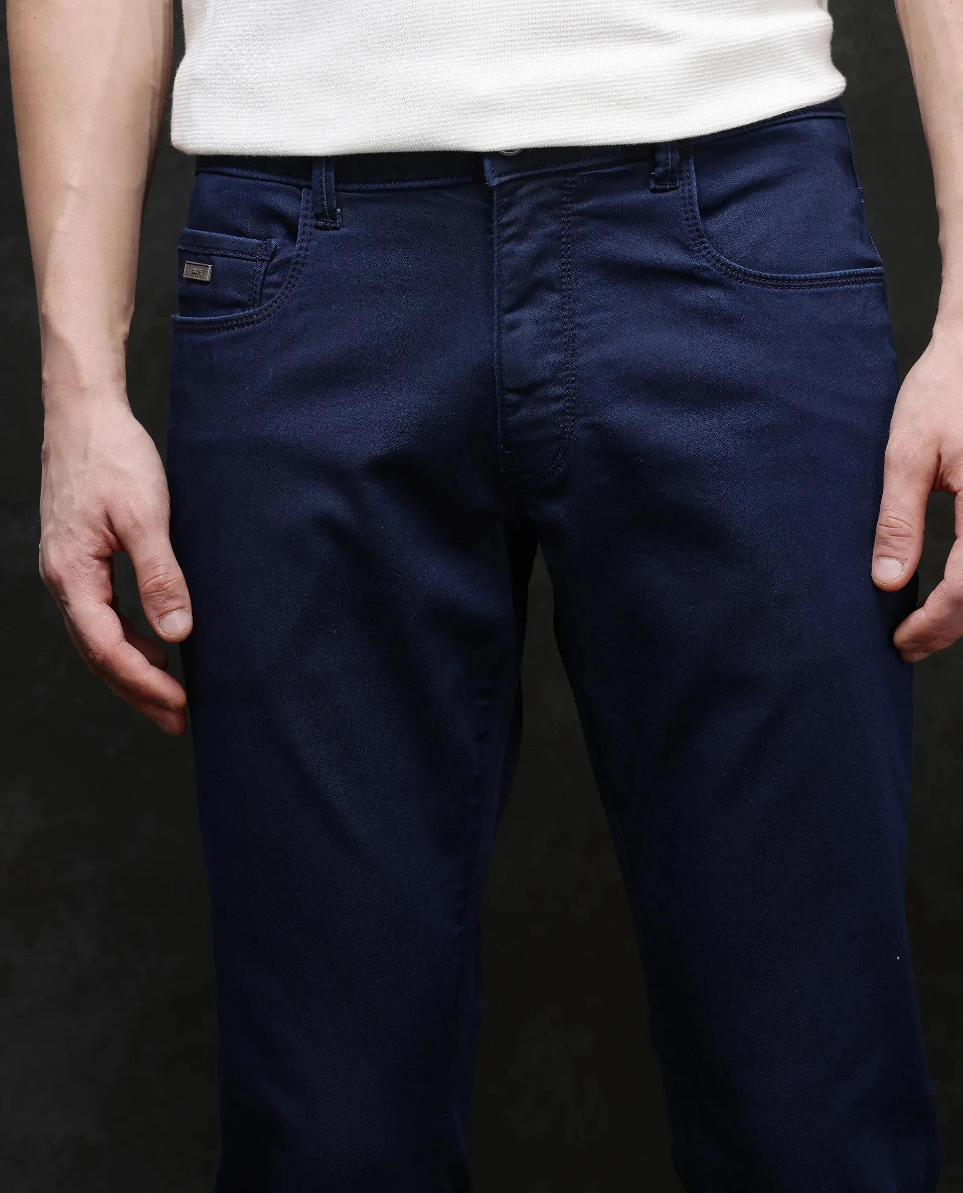 Rare Rabbit Men Corvo Blue Cotton Polyester Fabric Slim Fit Plain Denim Pant