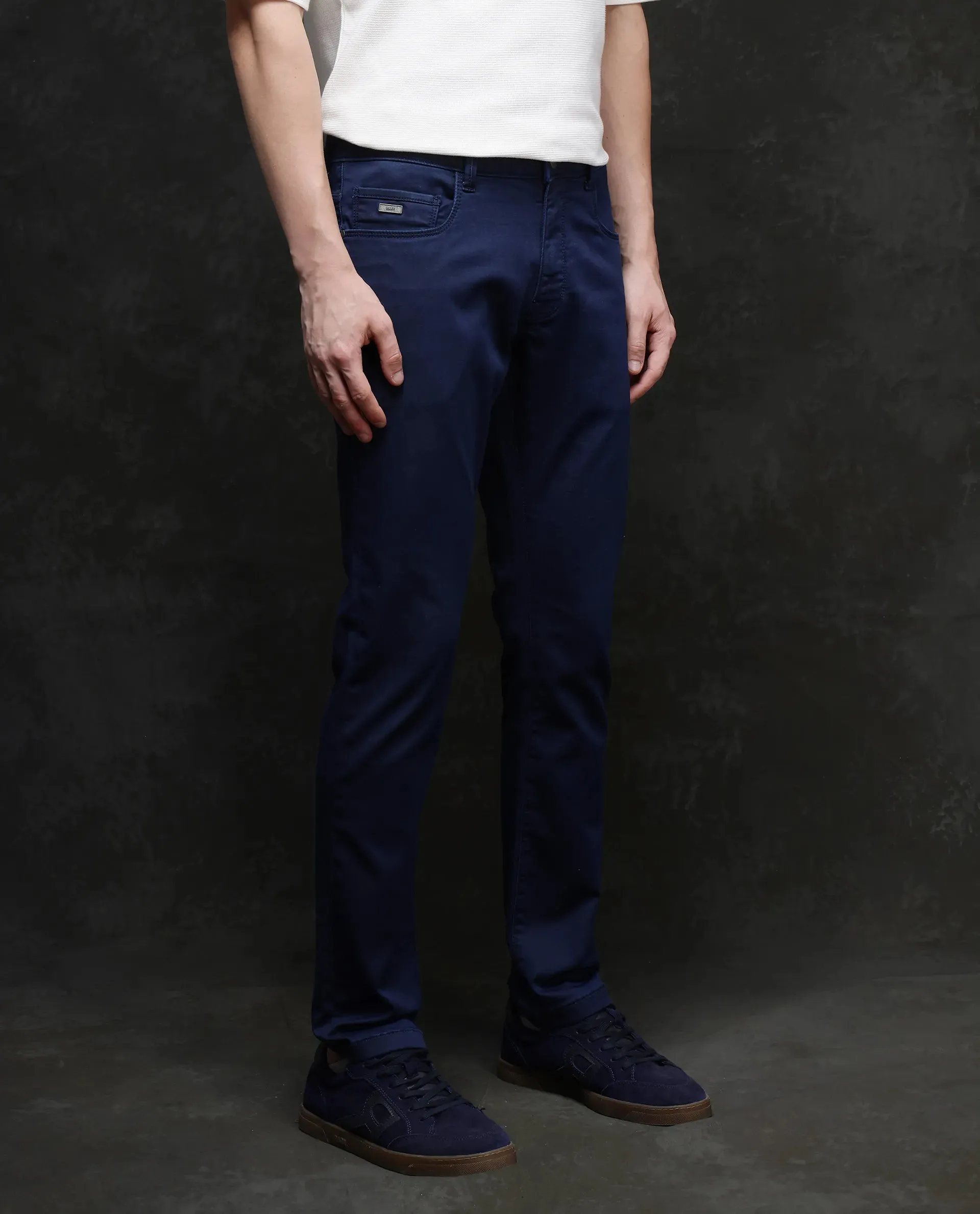Rare Rabbit Men Corvo Blue Cotton Polyester Fabric Slim Fit Plain Denim Pant