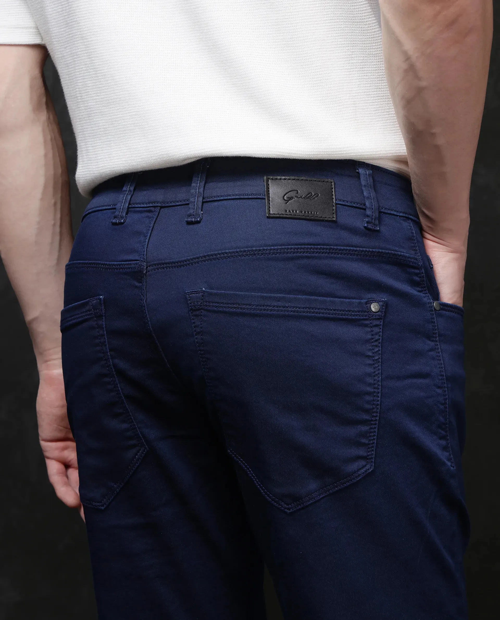 Rare Rabbit Men Corvo Blue Cotton Polyester Fabric Slim Fit Plain Denim Pant