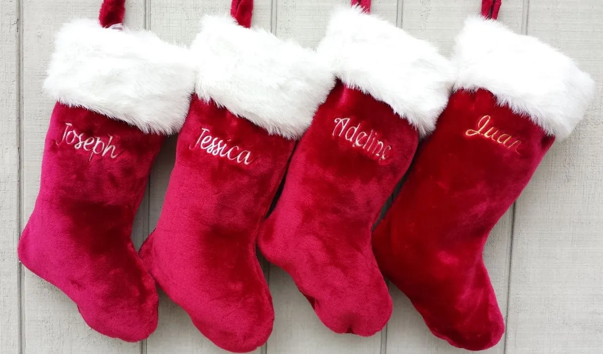 This luxurious plush 21'' Christmas stocking is a deep burgundy color with faux fox fur trim.